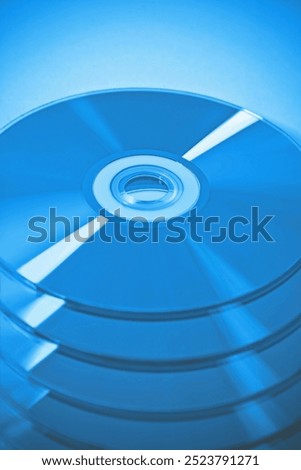 CDs in stack. Useful as a background.