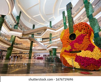 Cebu City, Philippines - Jan 2016: Interior Of Robinsons Galleria Cebu. A Large Floral Guitar Is The Most Striking Feature Inside The Central Atrium