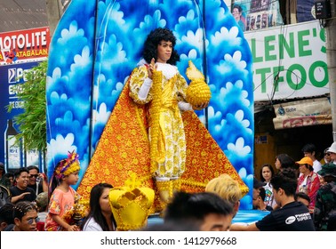 Cebu City , The Philippines - January 20, 2019: Living Man In Authentic Costume Looks Like Santo Nino Or Christ Child Statuette At The Sinulog Festival.