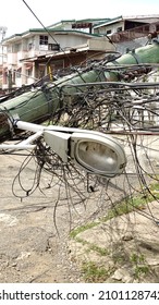 Cebu, Philippines - Dec 15 2021:  A Lamp From Fallen Telephone Pole