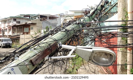 Cebu, Philippines - Dec 15 2021:  A Lamp And Fallen Utility Pole