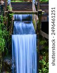 Cedar Creek Grist Mill Waterfall with Silky Motion in Woodland Setting