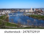 Cedar Rapids, Iowa, USA city view with Cedar River and bridges.