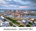 Cedar Rapids, Iowa, USA cityscape on the Cedar River at dusk.