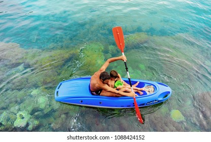 Cefalu, Italy - September 26, 2017: Man with child canoeing in the Mediterranean Sea in Cefalu, Palermo region, Sicily island in Italy - Shutterstock ID 1088424152
