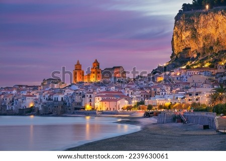 Cefalu, Sicily, Italy. Cityscape image if coastal town Cefalu in Sicily at dramatic sunrise.