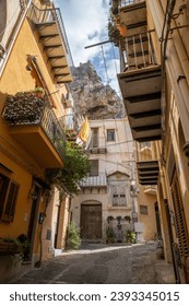 Cefalu in Sicily with its narrow mediterranean streets and balconies