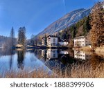 Cei is a summer resort especially for the people of Rovereto; the lake reflects the chain of Monte Bondone