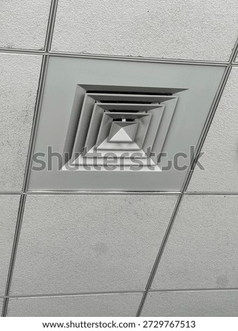 Ceiling air diffuser on a drop ceiling