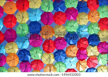 A ceiling of colorful umbrellas