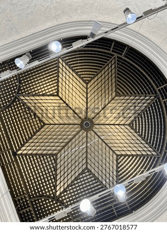 ceiling, light, lamp, fixture, star, pattern, glass, metal, frame, symmetry, design, interior, architecture, decorative, bright, bulbs, spotlight, illumination, grid, geometric, shape, radial, circle, dome, elegant, modern, classic, ceilinglight, structure, detail, overhead, lighting, ornamental, fixturedesign, brightness, reflection, clean, style, patternwork, panel, decorativeglass, framework, luminous, center, symmetrylines, indoor, illuminationdesign, aesthetic, feature