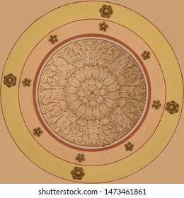 ceiling is ornamented with patterns