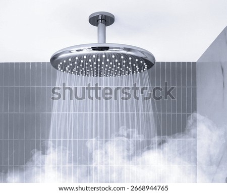 Ceiling rainfall shower head that creates a captivating water display accompanied by soothing steam
