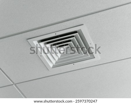 Ceiling socket for the ventilation duct of a cooling and heating system for large rooms, installed on a suspended ceiling. HVAC system