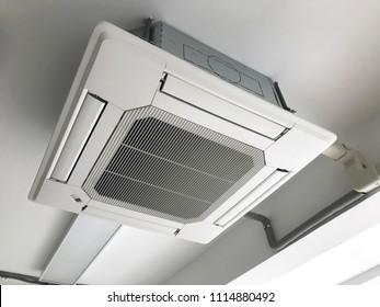 Ceiling type 4 directions air vent system hanging air conditioner unit in a modern office building
