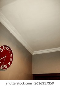 ceiling and wall clock in the room