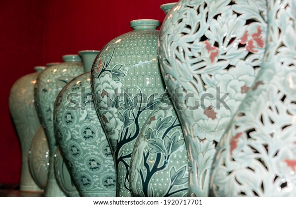 Celadon ceramics with showy patterns, displayed\
at the pottery festival