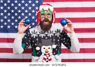 Celebrate With Bang. American Santa On National Flag Background. Patriotic Man Celebrate Christmas And New Year. Festive Patriotic Decor And Ornaments. Merry Xmas From USA. Patriotic Holidays Of USA.