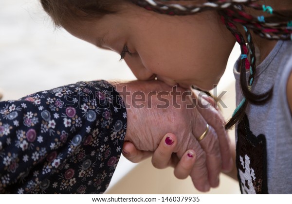 celebrate the\
victim feast of the elders on the religious holidays.happy mother\
and teachers day.kiss the mum\
hand.