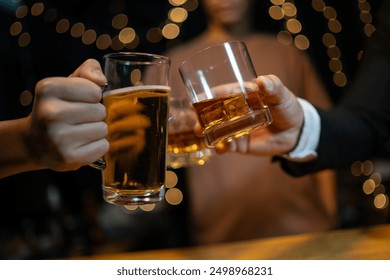 Celebrate whiskey on a friendly party in  restaurant - Powered by Shutterstock