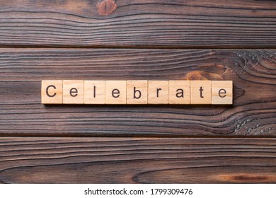 Celebrate Word Written On Wood Block. Celebrate Text On Cement Table For Your Desing, Concept.