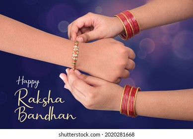 celebrated in India as a festival denoting brother-sister love and relationship. A sister is binding rakhi on her brother hand on the festival of raksha Bandhan