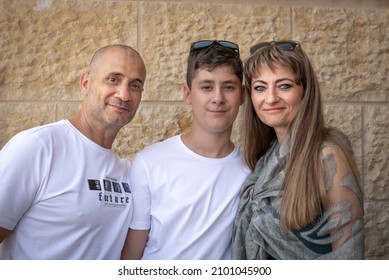 Celebrating A Bar Mitzvah At The Masada Fortress. A Young Family Celebrates A Bar Mitzvah For Their Son. Israel Fortress Masada Dead Sea Region November 28, 2021