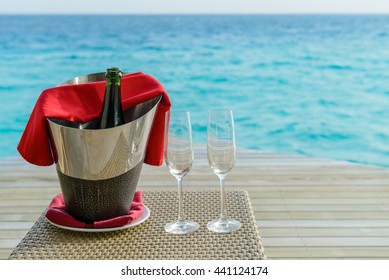 Celebrating With Champagne On The Beach