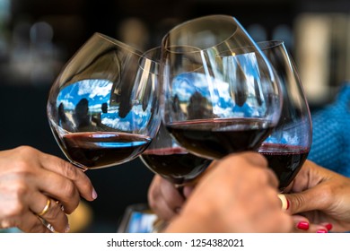 Celebrating Christmas Days Toasting Wine Glasses During A Celebration Day At Our Vacations During Lunch Time In A Vineyard At Casablanca, Chile 