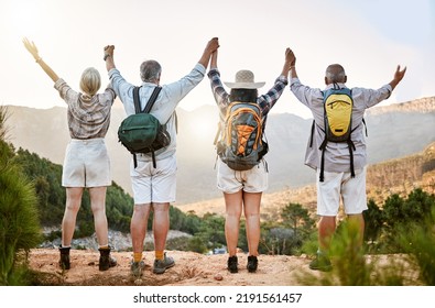 Celebrating Freedom, Fun And Hiking With A Group Of Senior Friends Taking A Mountain Hike And Enjoying The View. Rearview Of Retired Friends Spending Time Together And Bonding In The Forest Or Woods