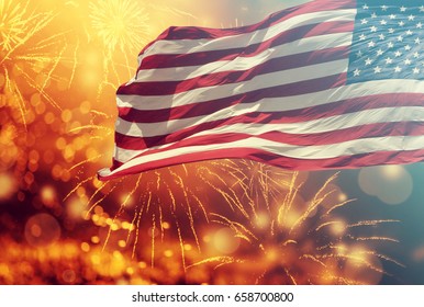 Celebrating Independence Day. United States Of America USA Flag With Fireworks Background For 4th Of July