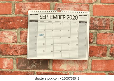 Celebrating Labor Day September 2020 Calendar Hanging On Brick Wall