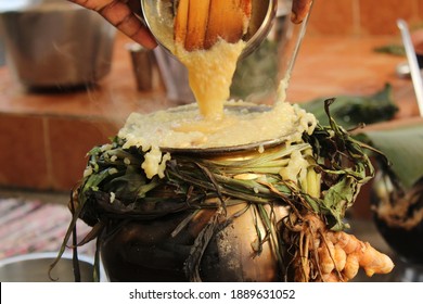 Celebrating Traditional Thai Pongal Festival To Sun God With Pot, Lamp,wood Fire Stove, Fruits And Sugarcane. Making Sakkarai Or Sugar Pongal And Ven Pongal In Sand Stove In Traditional Method.