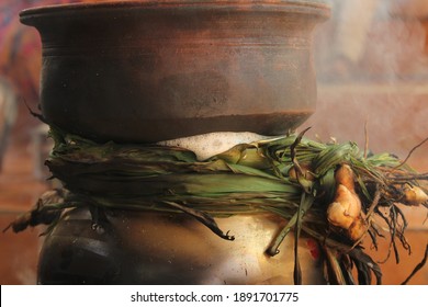 Celebrating Traditional Thai Pongal Festival To Sun God With Pot, Lamp,wood Fire Stove, Fruits And Sugarcane. Making Sakkarai Or Sugar Pongal And Ven Pongal In Sand Stove In Traditional Method.