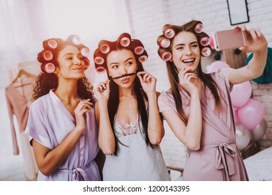 Celebrating Women's Day. Emotional Women. White Interior. International Women. Happy Womens Day. Smiling Women Make Selfie. Happy Face. Smiling Girls With Phone. Women With Curlers In Hair.