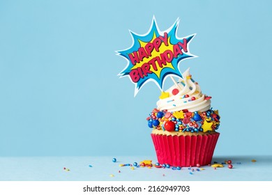 Celebration birthday cupcake with superhero happy birthday cake pick - Powered by Shutterstock
