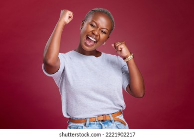 Celebration, black woman and excited person showing happiness and winner feeling. Winning motivation, achievement and happy smile of a female win with a celebrate victory feeling from success - Shutterstock ID 2221902217