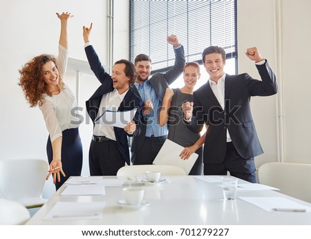 Celebration of business team with enthusiasm in start-up