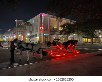 CELEBRATION, FL, USA - DECEMBER 4, 2019: Horse Sleigh Ride At Celebration Florida Night Photo