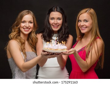 Celebration, Food, Friends, Bachelorette Party And Birthday Concept - Three Smiling Women Holding Cake With Candles