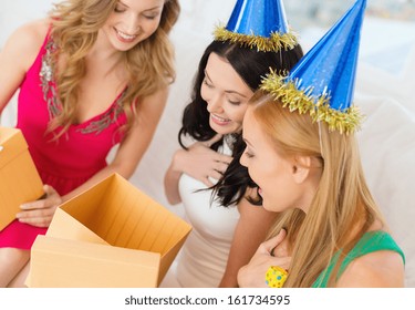 Celebration, Friends, Bachelorette Party, Birthday Concept - Three Smiling Women Wearing Blue Hats With Gift Boxes