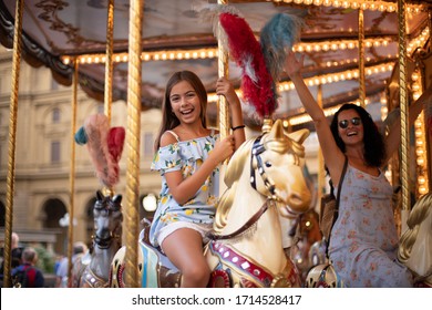 Celebration Of Happy Days At The Fair With Merry Go Round. Mothers Day Concept At The Outdoors.