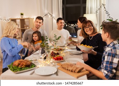 Celebration, Holidays And People Concept - Happy Family Having Dinner Party At Home