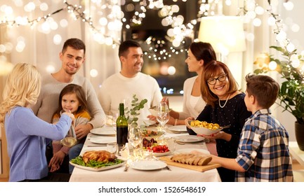 Celebration, Holidays And People Concept - Happy Family Having Dinner Party At Home