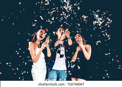 Celebration Party Group Of Asian Young People Holding Confetti Happy And Funny Concept