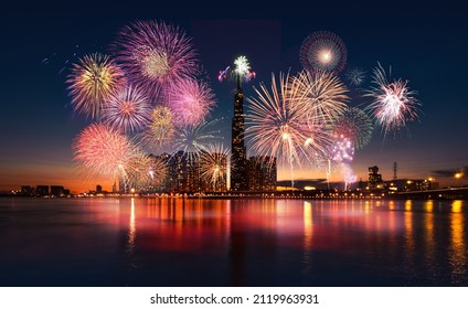Celebration. Skyline with fireworks light up sky over Landmark 81 skyscraper in Ho Chi Minh City ( Saigon ), Vietnam. Beautiful night view cityscape. Holidays, celebrating New Year and Tet holiday - Shutterstock ID 2119963931