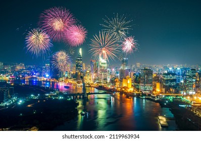 Celebration. Skyline With Fireworks Light Up Sky Over Business District In Ho Chi Minh City ( Saigon ), Vietnam. Beautiful Night View Cityscape. Holidays, Celebrating New Year And Tet Holiday