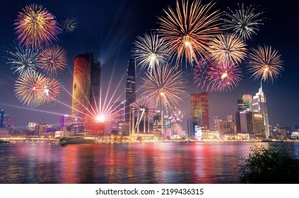 Celebration. Skyline With Fireworks Light Up Sky Over Business District In Ho Chi Minh City ( Saigon ), Vietnam. Beautiful Night View Cityscape. Holidays, Independence Day, New Year And Tet Holiday