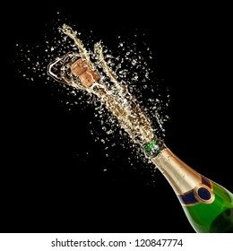  Celebration theme with splashing champagne, isolated on black background
