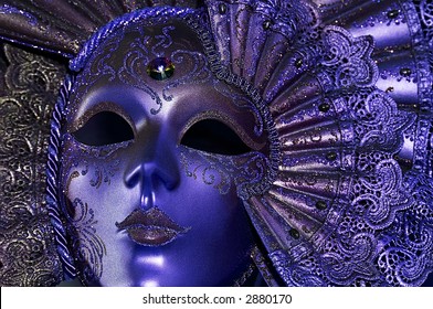 Celebratory dark blue mask with a jewel